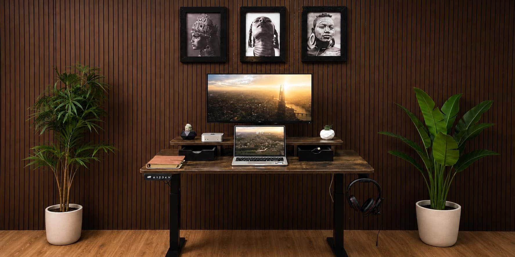 An Ergolevel standing desk in Rustic Dark Walnut against a wood-slat wall
